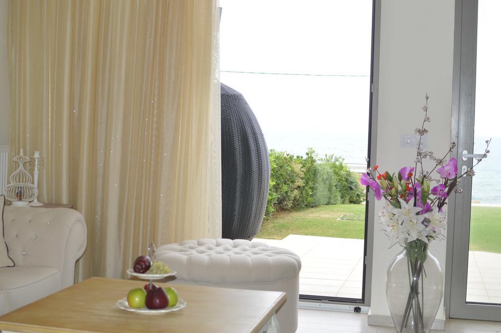 Sea View Beachfront Villa Maria Гуве Экстерьер фото